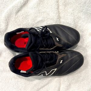 New Balance Burn Black and Red cleats
